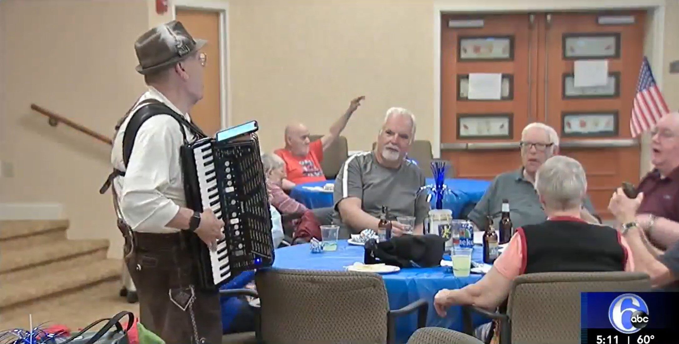 man playing accordion for Oktoberfest celebration